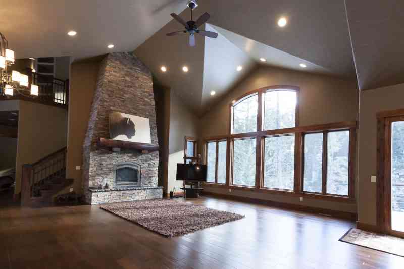 The focal point of the living room - a tapered stone fireplace.