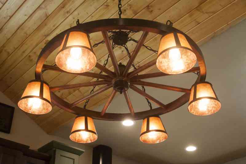 The wheel chandelier that tied everything together in the kitchen!