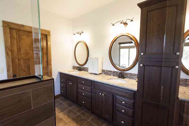 The double master vanity with granite tops.