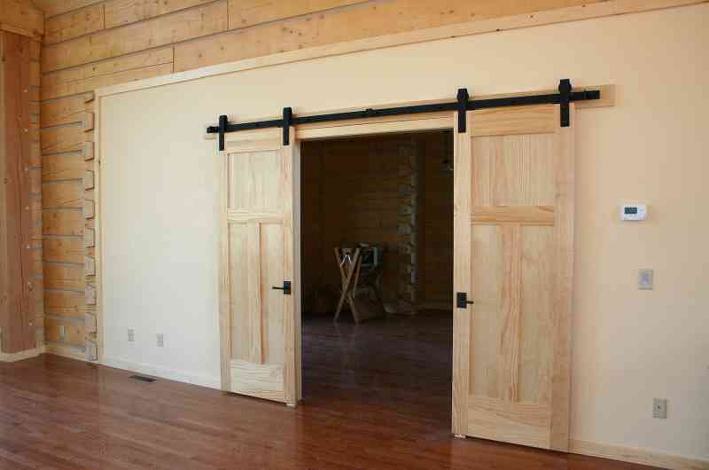 Double sliding barn doors were a great addition to this room!