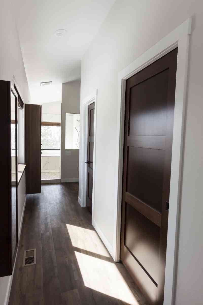 The hallway leading from the master bedroom to the bath.
